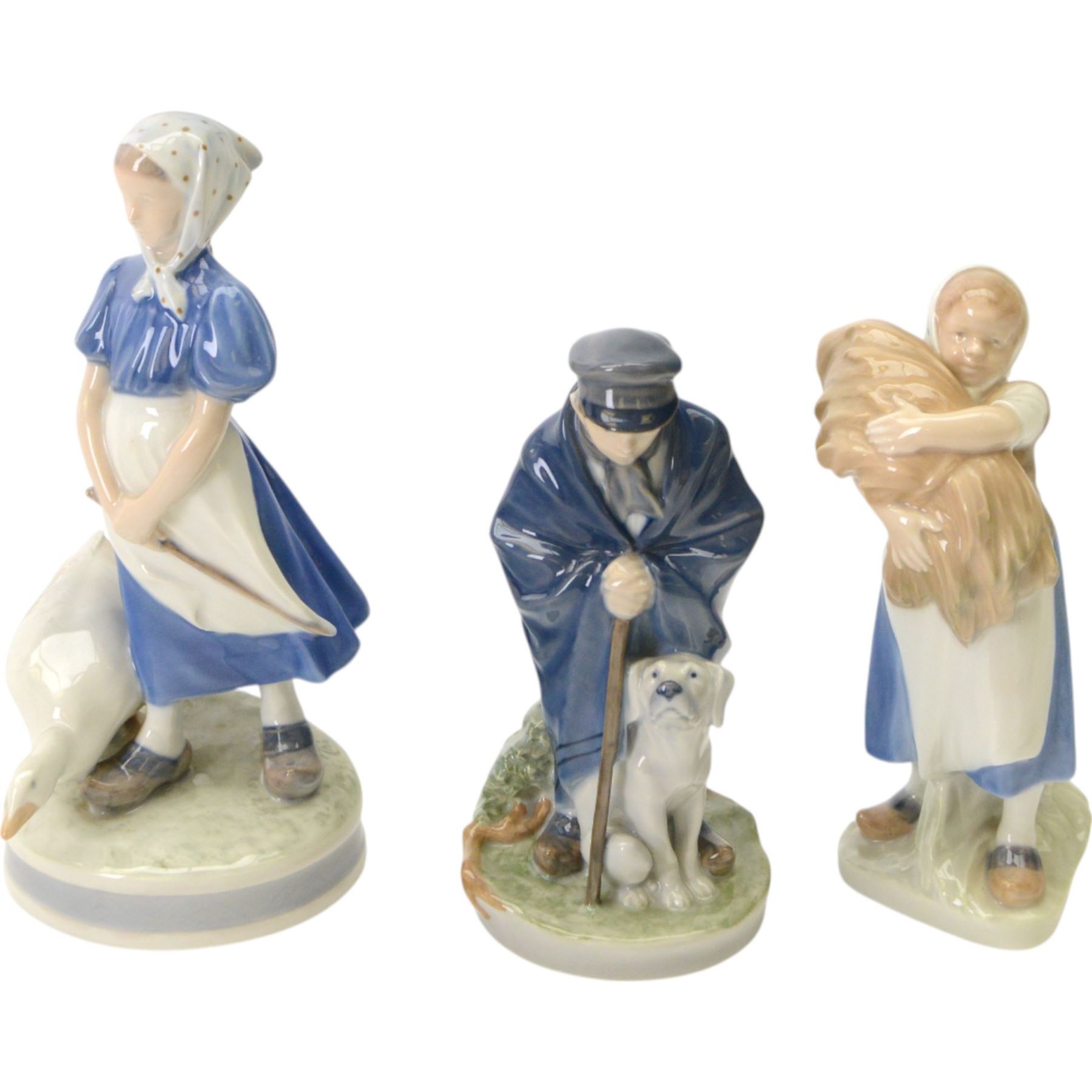 Six Royal Copenhagen figures, including shepherd with dog no 782, Farmer with scythe, no 685, Girl with Goose, no 527, and Boy with Geese, no 2139 etc 