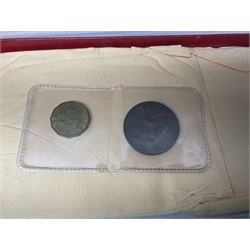 Four King George VI 1950 specimen coin sets, each comprising farthing, half penny, penny, threepence, sixpence, English  one shilling, Scottish one shilling, two shillings and half crown, each in red Royal Mint card case