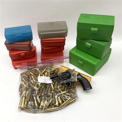 Olympic No6 blank firing revolver with fifty-six blanks, various brass cases, and eleven plastic ammunition boxes of various sizes