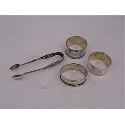 Pair of Victorian silver sugar tongs, with pierced decoration, hallmarked Hilliard & Thomason, Birmingham 1892, together with three hallmarked silver napkin rings