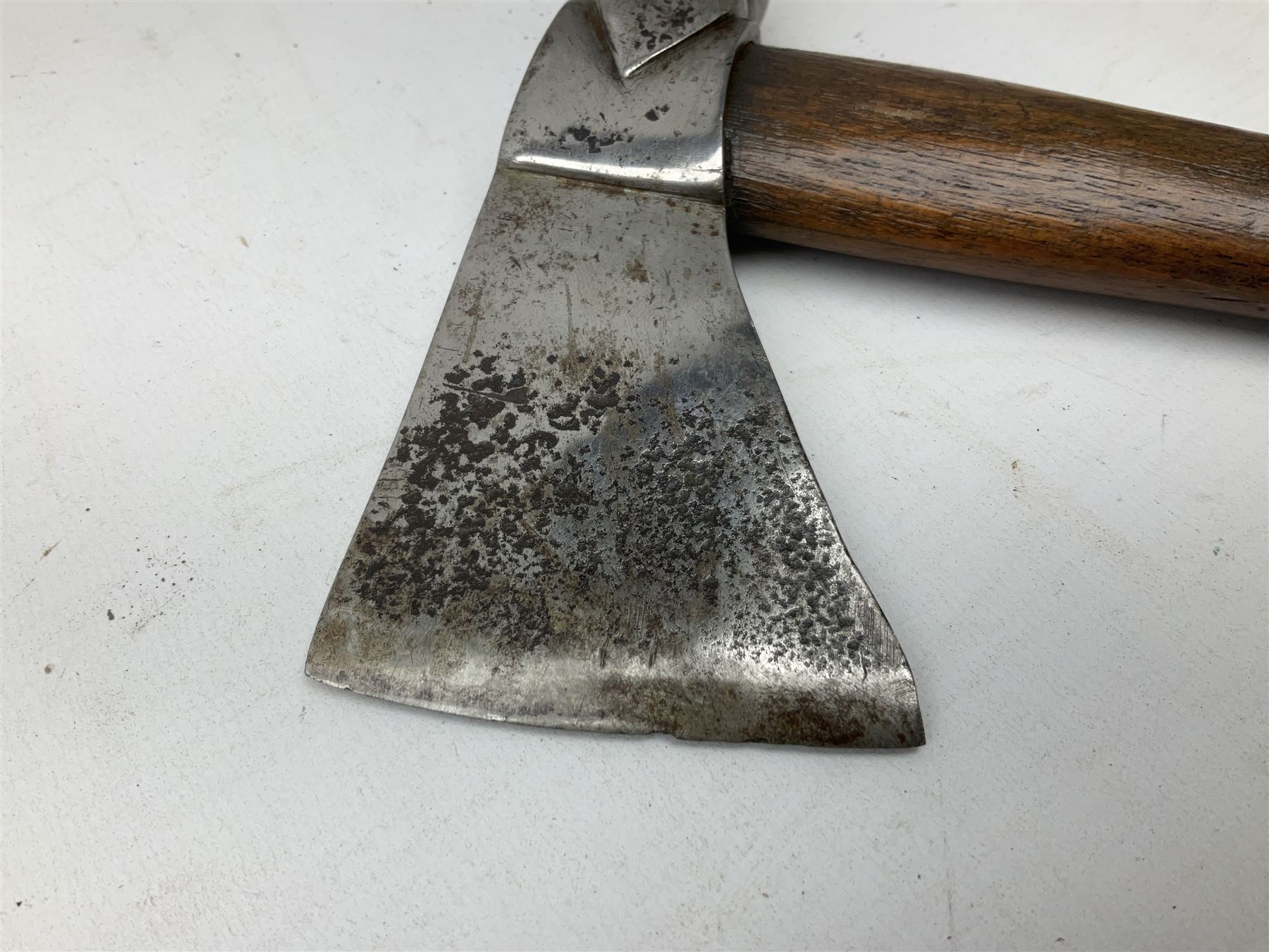 Early 20th century ceremonial Tomahawk pipe, steel axe head with pipe bowl, drilled drawing shaft, 46cm