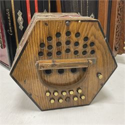 Three European concertinas, comprising Viceroy German concertina with 21 keys, hexagon wooden frame and 8 fold bellows
Oak framed concertina with 12 keys and 8 fold bellows
Commander concertina with 12 keys and 12 fold bellows
With tutor