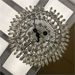 Early 20th century dome top glass chandelier, with moulded acanthus decoration suspending five tiers of faceted crystal drops