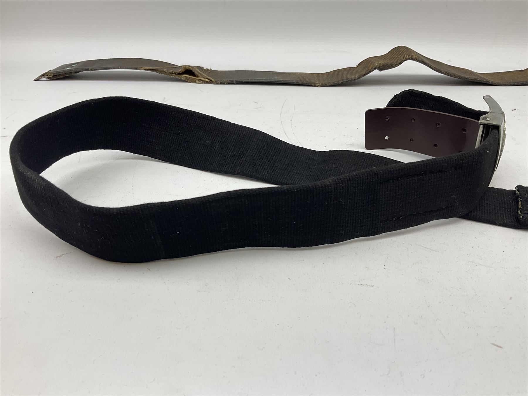 WW2 German Hitler Youth belt, the buckle marked 'Blut Und Ehre' and impressed RZM M/4/55 verso; and another Hitler Youth belt with similarly marked buckle (2)