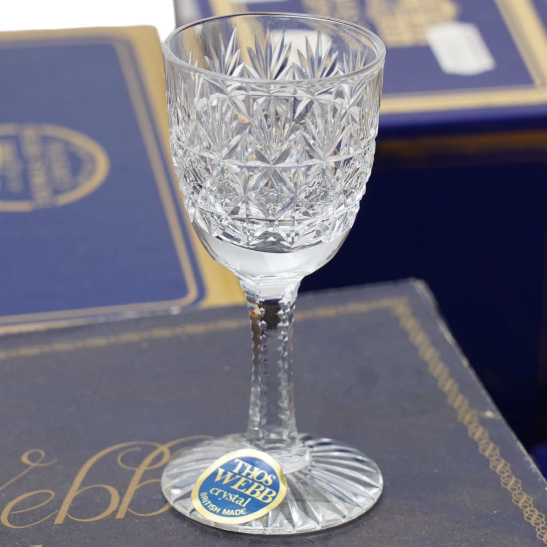 Large collection of boxed Thomas Webb crystal examples, mostly drinking vessels, in various patterns, between two boxes