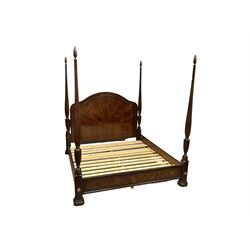 Regency design 6’ SuperKing mahogany bedstead, shaped headboard with crossbanding and sunburst veneer with moulded edge, the four posts with finials and reeded coration with urn shaped bases, on four stepped plinth bases