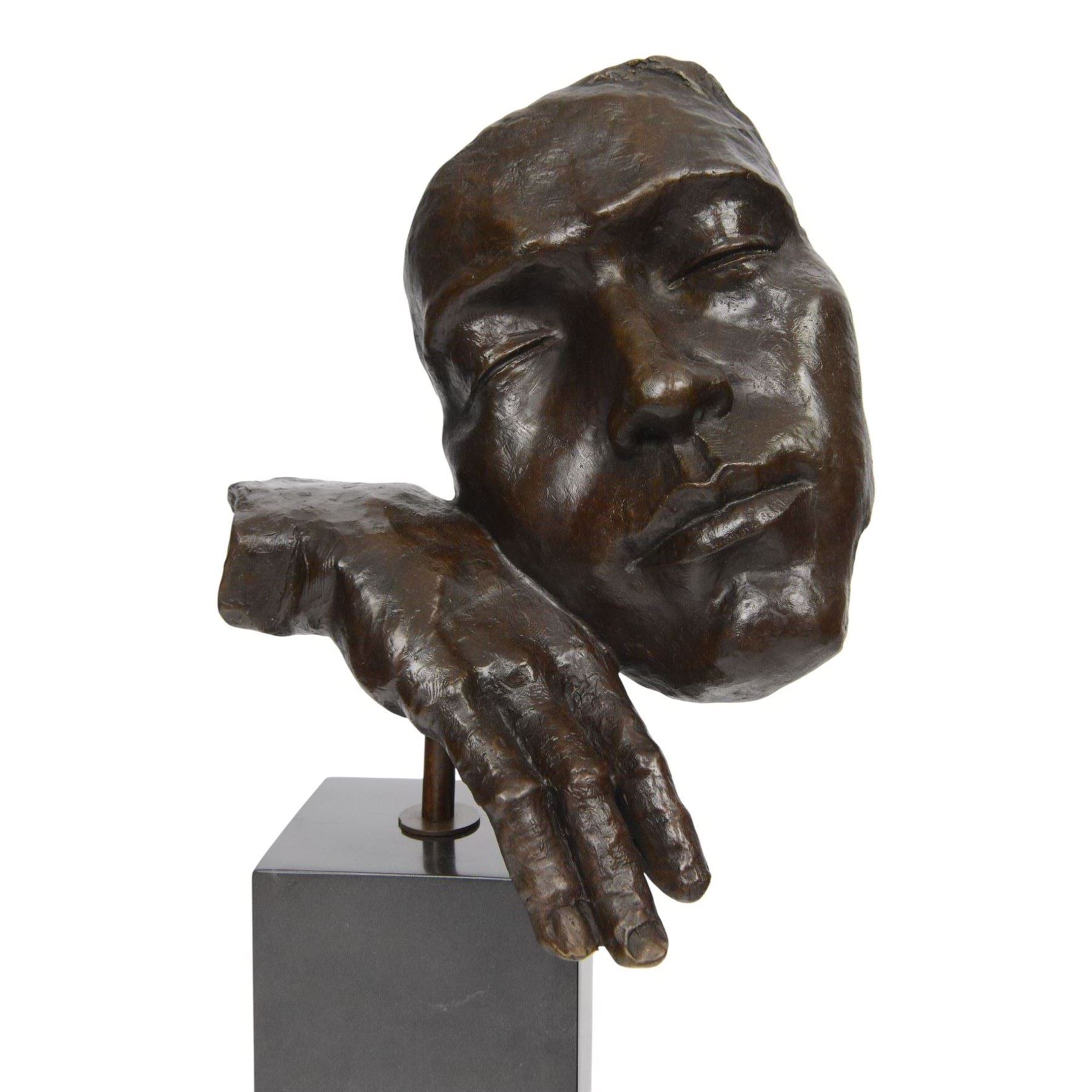 After Salvador Dali (Spanish 1904-1989): Dreams, bronze figure with head resting on hand H39cm
