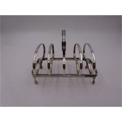 Edwardian silver toast rack, with five kidney shaped bars and loop handle, upon rectangular base and four claw feet, hallmarked Joseph Rodgers & Sons, Sheffield 1908, H9cm