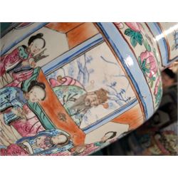 Pair of Chinese Canton famille rose vases, with panels of court terrace scenes surrounded by foliate borders, H35cm 