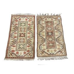 Two pale ground Turkish rugs 