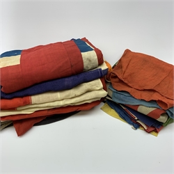 Thirty-seven various flags, pennants etc including Union flags, blue ensign, white ensign, Royal Standard, Scottish Rampant, Wales, Old Canada red ensign, Australia and New Zealand, France, Germany, South Africa (1928-94), semaphore and signal flags, 'God Save The King' banner, bunting flags etc