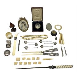Assorted collectables, to include bog oak pin cushion modelled as a cauldron, painted portrait miniature upon ivory and a woman, in oval gilt metal frame, pair of silver handled ivory glove stretchers, group of assorted bone items, S Mordan & Co propelling pencil, etc. 