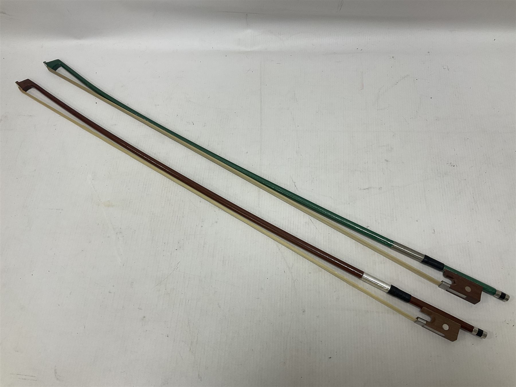 Zest full size pink violin, with a solid wood body and maple head, with matching pink bow and two further bows, in a hard case Length 60cm