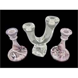 Daum glass two stemmed candle stick signed to verso, together with a pair of slag glass purple candle sticks, Daum H21cm