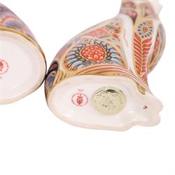 Three Royal Crown Derby paperweights, comprising Field Mouse gold stopper, Siamese cat gold stopper and seated cat gold stopper