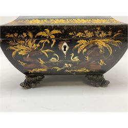 Regency papier-mâché box, decorated in the chinoiserie taste, with twin ring handles and four stylised feet, the cover painted with a figural scene above a front painted with two birds upon water, H15cm L23.5cm 