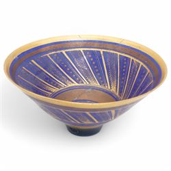 Mary Rich (1940-2022); three studio pottery footed bowls, in blue with gilt geometric decoration, impressed potters seal to base, largest D28cm (3)