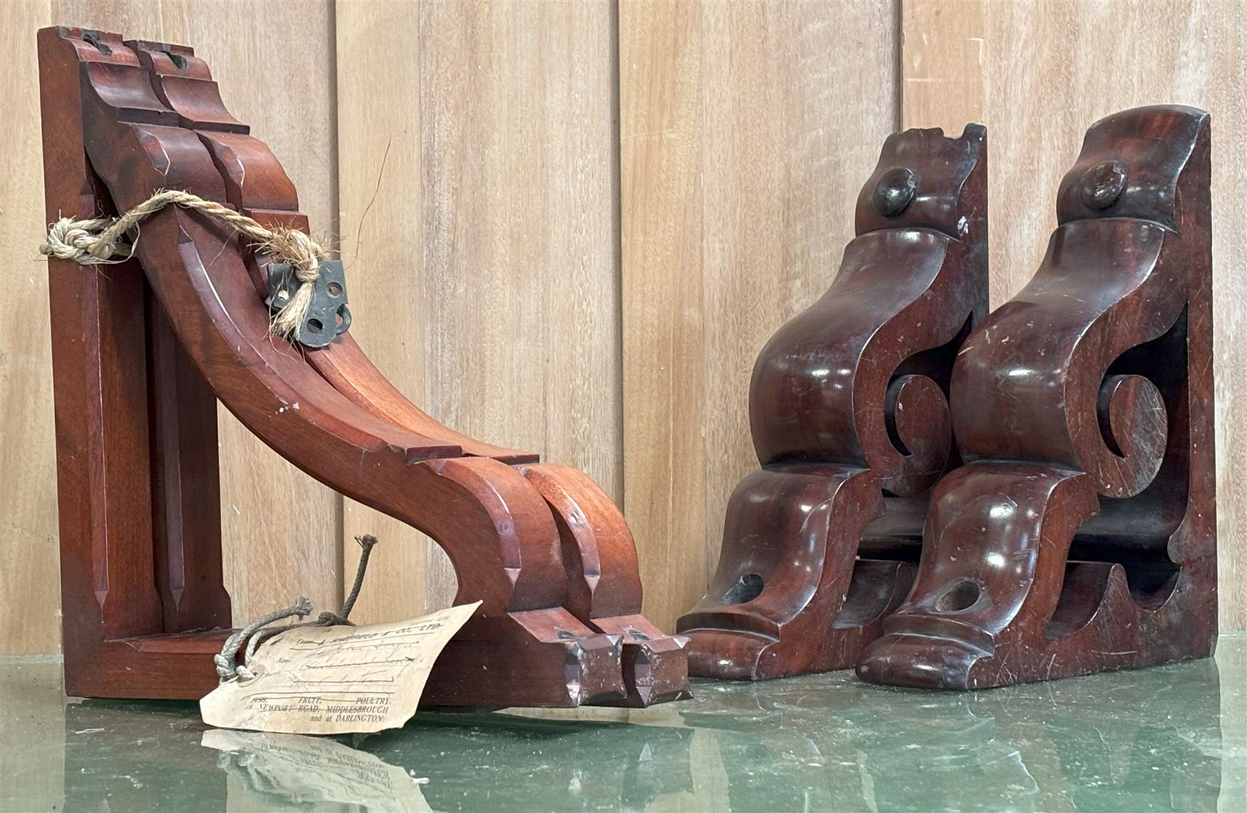 Pair of Victorian pierce carved mahogany wall brackets of scrolling form (30cm x 21.5cm, D8cm) together with a pair of walnut brackets, complete with iron fittings and an old depository label (32cm x 34cm, D4cm) (4)  - COLLECTION BY APPOINTMENT FROM: The White House, Thirsk Road, Easingwold, York, YO61 3NF - CALL 01723 507111 TO ARRANGE