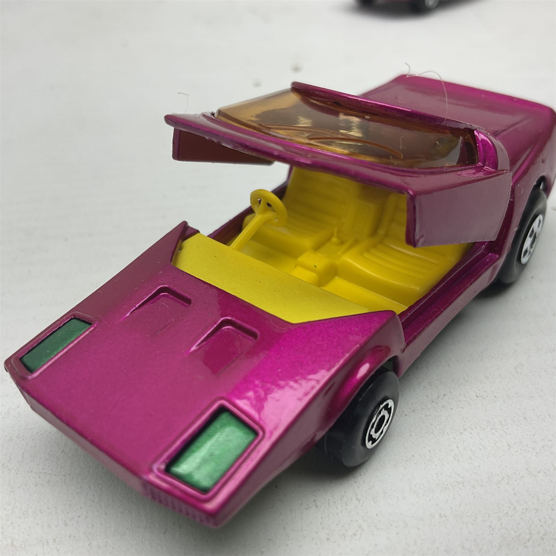 Matchbox 1-75 Series ex-shop stock - eight models comprising 30d Beach Buggy, 32d Maserati Bora, 34d Formula 1 Racing Car, 36d Hot Rod Draguar, 39d Clipper, 40d Vauxhall Gildsman, 41d Siva Spyder and 43d Dragon Wheels; all boxed (8)