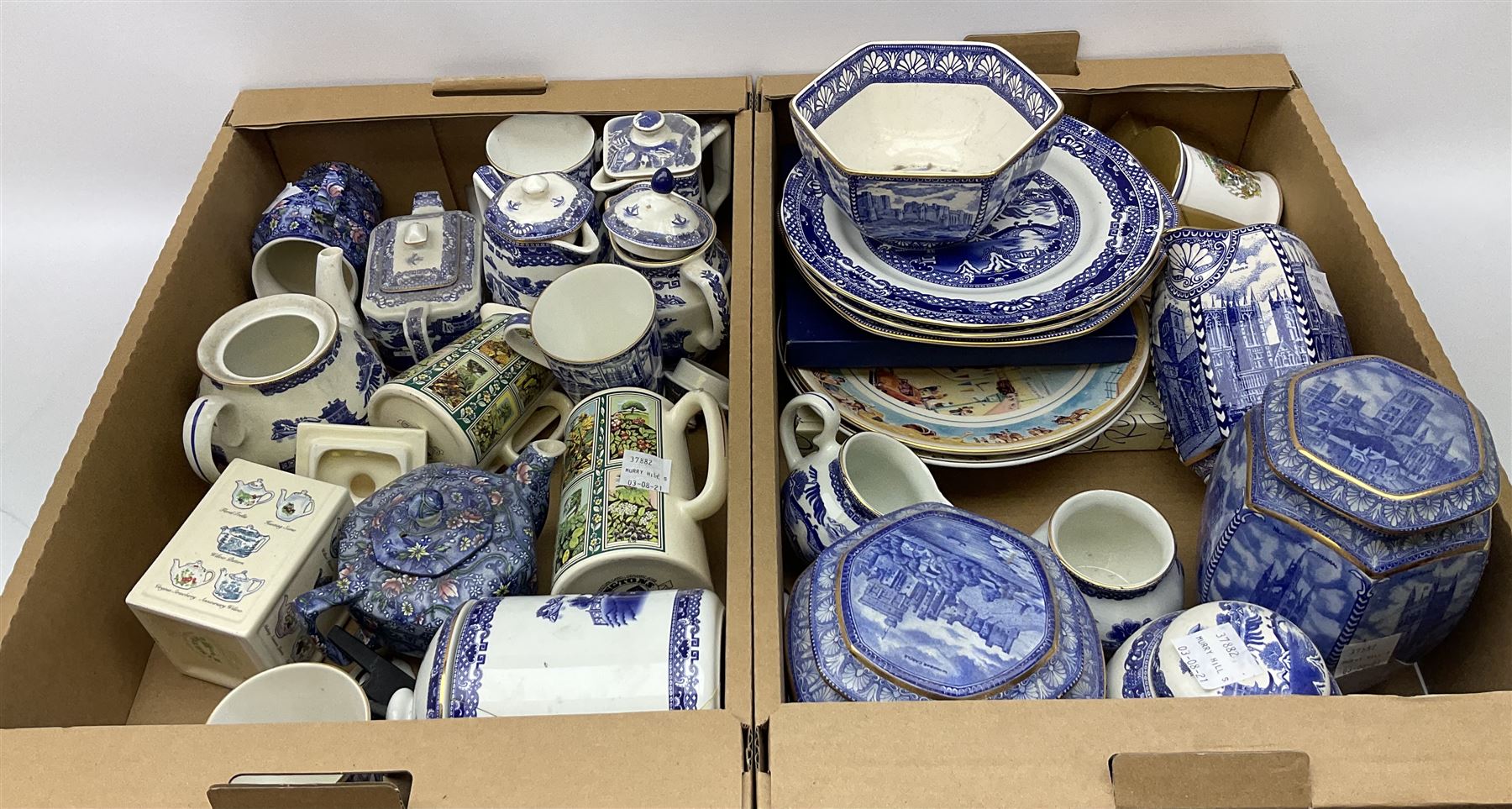 Collection of Ringtons tea and dinnerware, including a set of willow pattern milk jug and sugar bowl,  teapot and milk jug with floral decoration, a selection of storage jars etc, two boxes. 