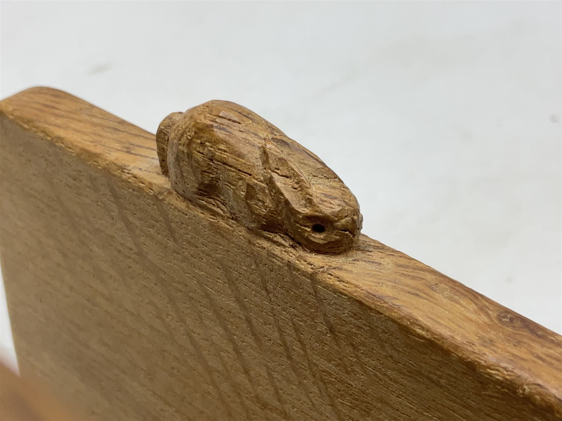 'Rabbitman' oak letter rack of two graduated square panels on a slab base, with carved with rabbit signature, by Peter Heap of Wetwang, H12cm