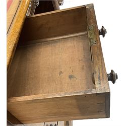 Victorian figured walnut kneehole desk, moulded rectangular top with inset leather writing surface, fitted with nine drawers, the central frieze drawer with carved curled foliage mount, on moulded plinth base,