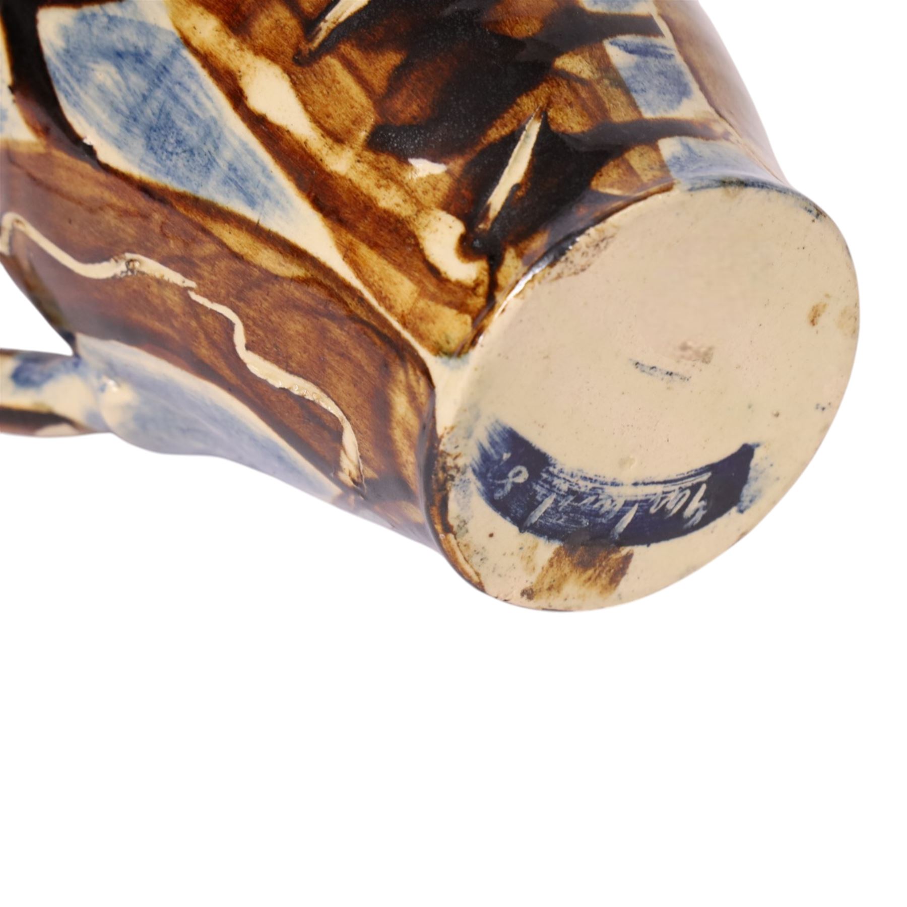 David Garland (b.1941) jug, decorated in a blue and brown glaze, with leaves and abstract patterns, H27cm