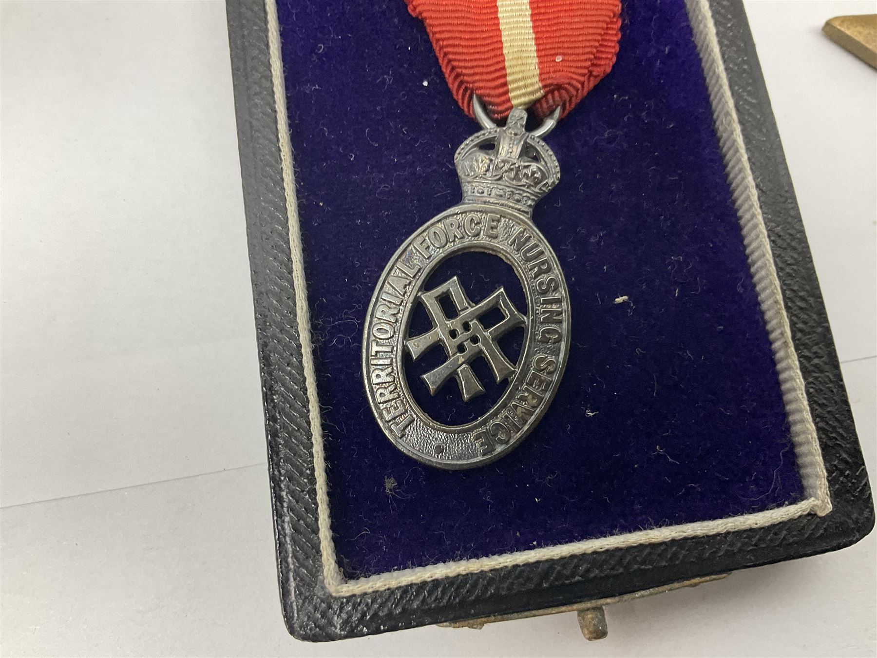 Gaunt & Son Territorial Force Nursing Service cape medal; cased; WW1 British War Medal and 1914-15 Star (names erased); two MID oak leaves; Polish and American medals; eight replica medals including VC, MM, Air Crew Europe Star etc and replica group of five WW2 miniatures etc