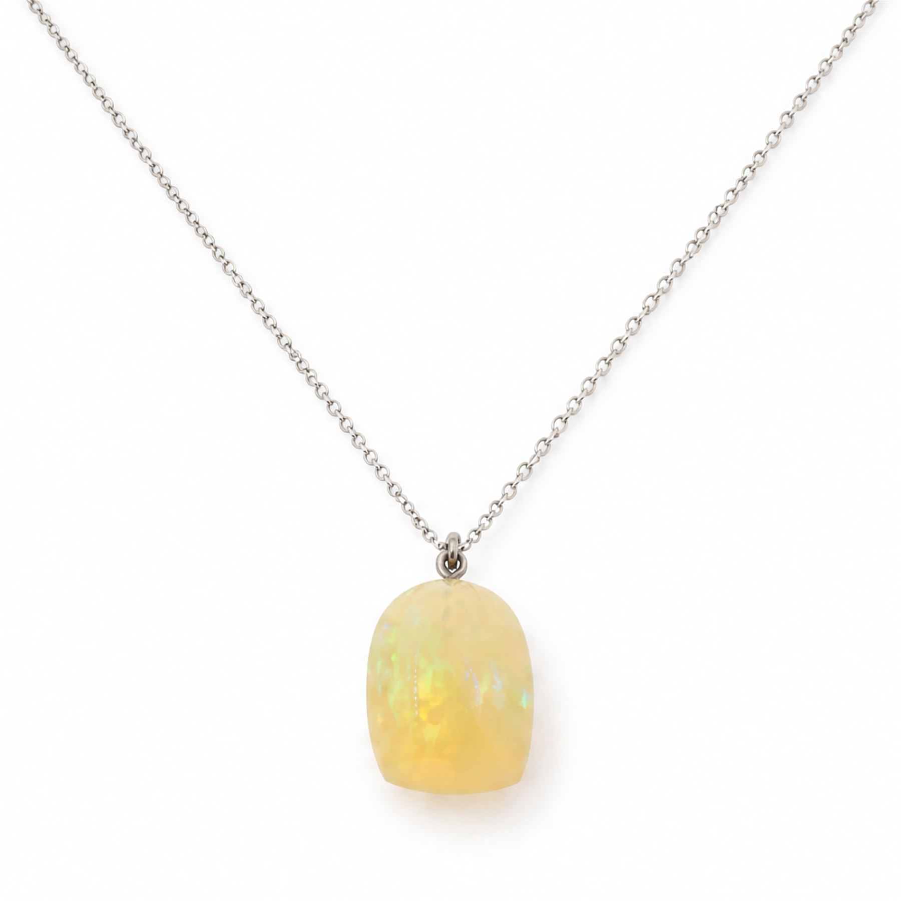 18ct opal pendant necklace, single vari-cut opal of approx 15.00 carat, on a fine trace link chain necklace, stamped 750