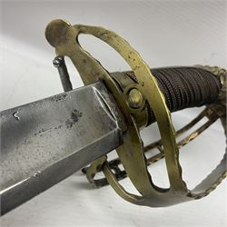 Late 18th century French 1st Empire Troupe a Pied Petit Montmorency Branch Tournante officer's sword, with 72.5cm slightly curving fullered blade, pierced brass hilt with lockable swivelling bar, fully wire-bound grip with lion head pommel, L88cm overall (no scabbard)