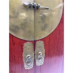  Chinese red lacquered elm and pine Moon marrige cabinet, enclosed by two doors, brass metalwork and hinges