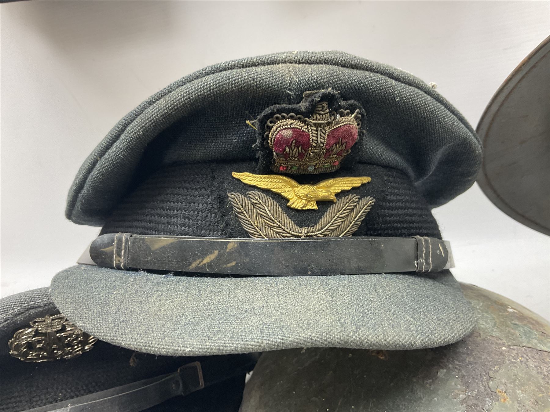 Two air force jackets, together with two helmets and Bamberger Mutzen Industrie German military hat and two others 