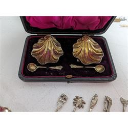 Pair of late Victorian silver open salts, each modelled as clam shells with gilded bowls and salt spoons, hallmarked William Hutton & Sons Ltd, London 1899 and 1900, with two silver spoons and a set of six silver plated spoons