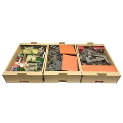 '0' gauge - assorted track and trackside accessories including right angle and acute crossings, points, turntables, buffer stops, level crossings, signals etc; some boxed; and small quantity of three-rail track; in three boxes