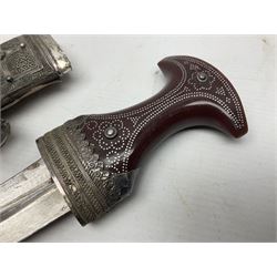 Omani Khanjar dagger, the 12.5cm curved blade with pronounced medial rib to either side, waisted horn style hilt with dome shaped pommel and inlaid pique work; in an intricately filigree decorated white metal scabbard with rings woven into the belt mount L25cm overall
