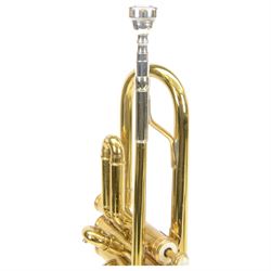 Besson brass trumpet, with three piston valves and finger hook, heavily lacquered finish with mouthpiece, within a velvet lined hard case
