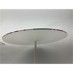 Two 1960s circular white finish cast metal stands, tilted top with slender stems and circular base, H37cm & H35cm (2)