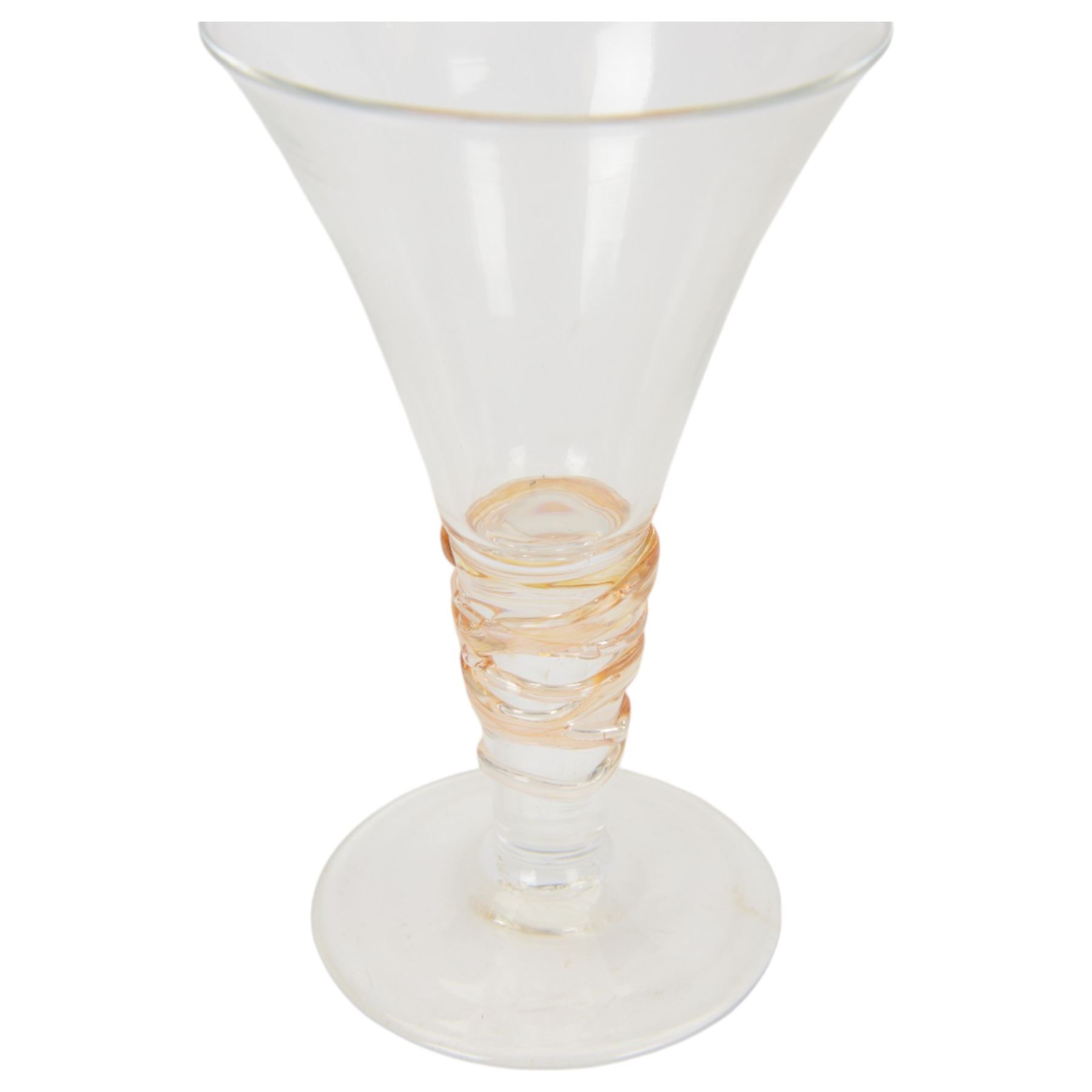 Gillies Jones of Rosedale oversized wine glass, decorated with white abstract decoration, together with a smaller Gillies Jones of Rosedale trumpet shaped wine glass with applied coloured glass ribbon to stem and a Deborah Fladgate purple fluted glass dish, all signed to base, tallest H24.5cm