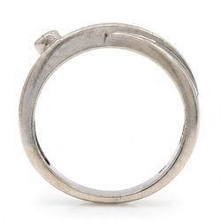 14ct white gold four stone diamond crossover ring, rubover and bezel set with four round cut diamonds, stamped 585