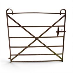 Georgian wrought iron strapwork gate, with arched cresting rail ends and hinged latch