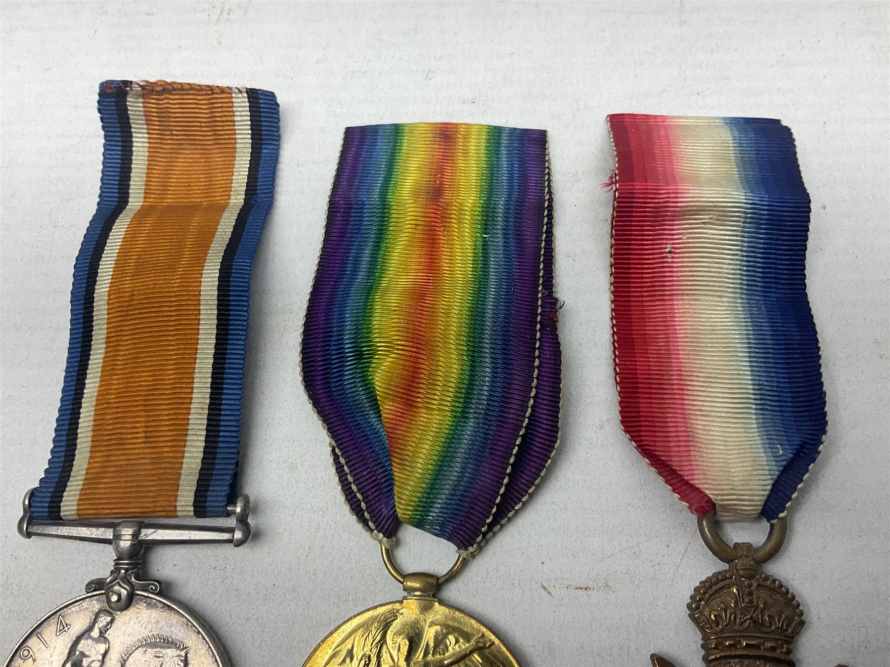 WW1 group of three medals comprising British War Medal, 1914-15 Star and Victory Medal awarded to 61813 Bmbr. E. Robbins R.F.A./R.A.; with ribbons