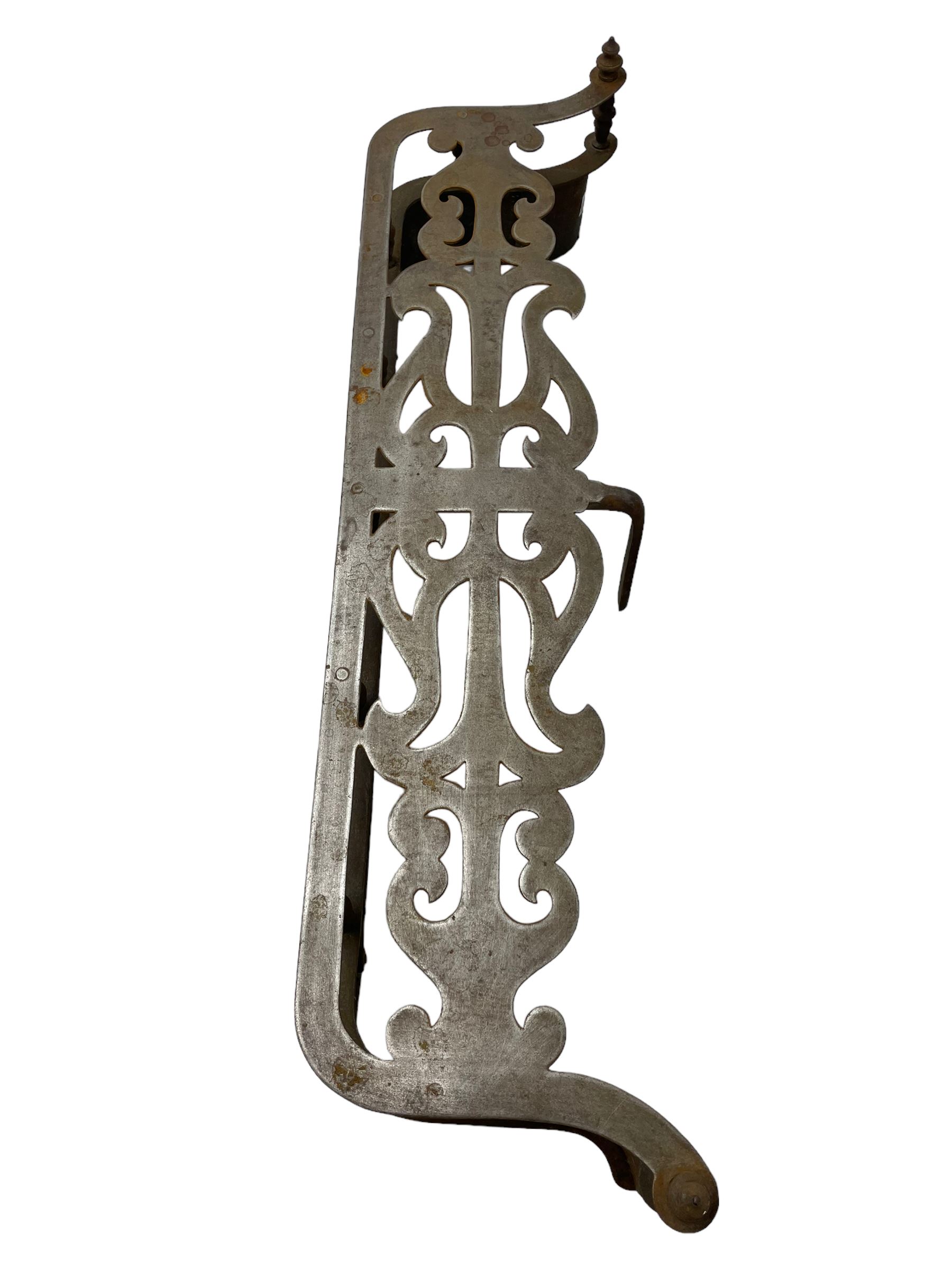 Victorian steel fire fender, the shaped open fretwork top in a scrolled