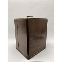 19th century mahogany travelling apothecary cabinet, with recessed brass carry handle to top, and two deep-section hinged doors to the front opening to reveal a fitted interior with clear glass bottles and two drawers, H27cm