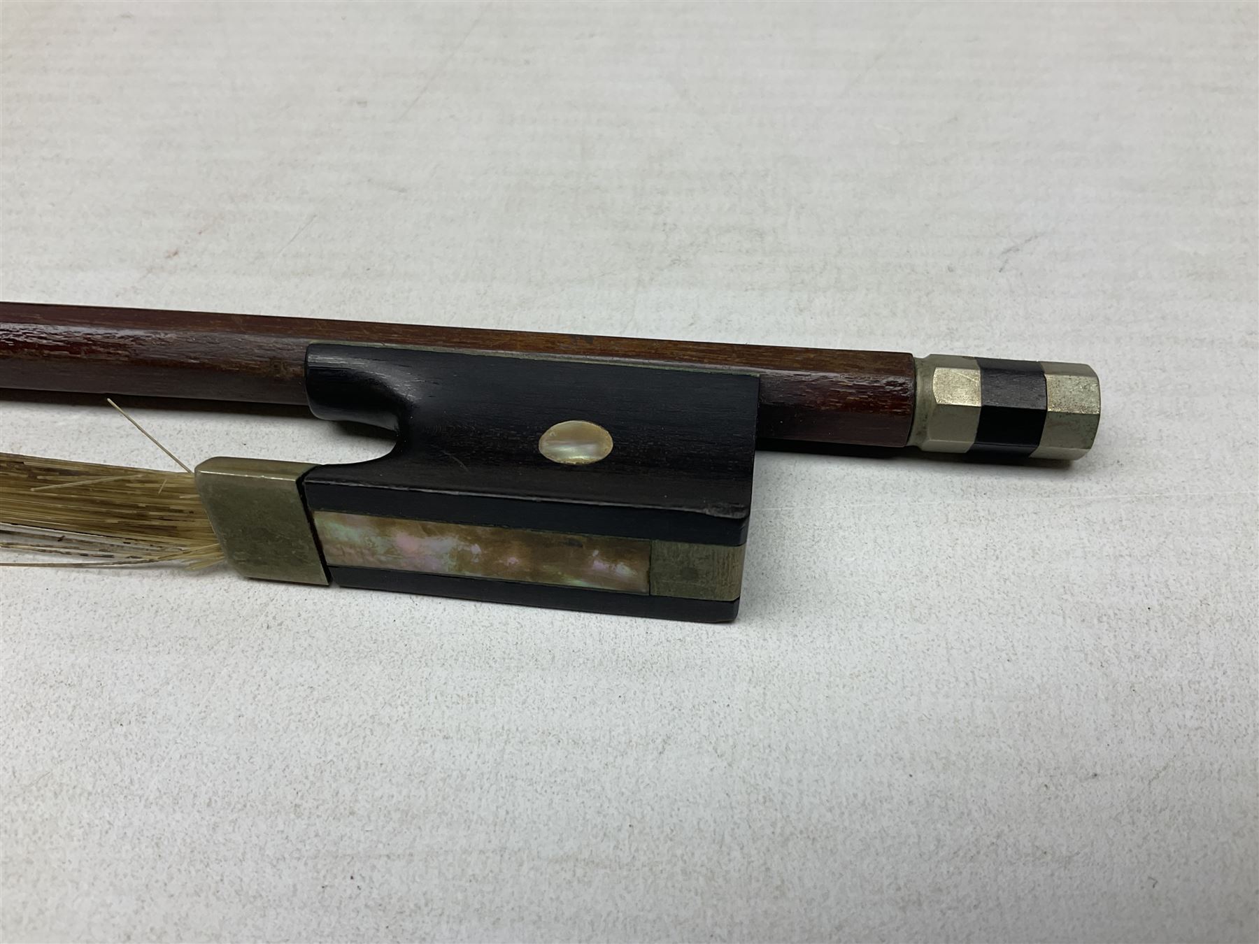 German copy of a Maggini violin c1900 with 35.5cm two-piece maple back and ribs and spruce top, bears label 'Maggini Deutsche Arbeit 1866' L59cm; in carrying case with bow