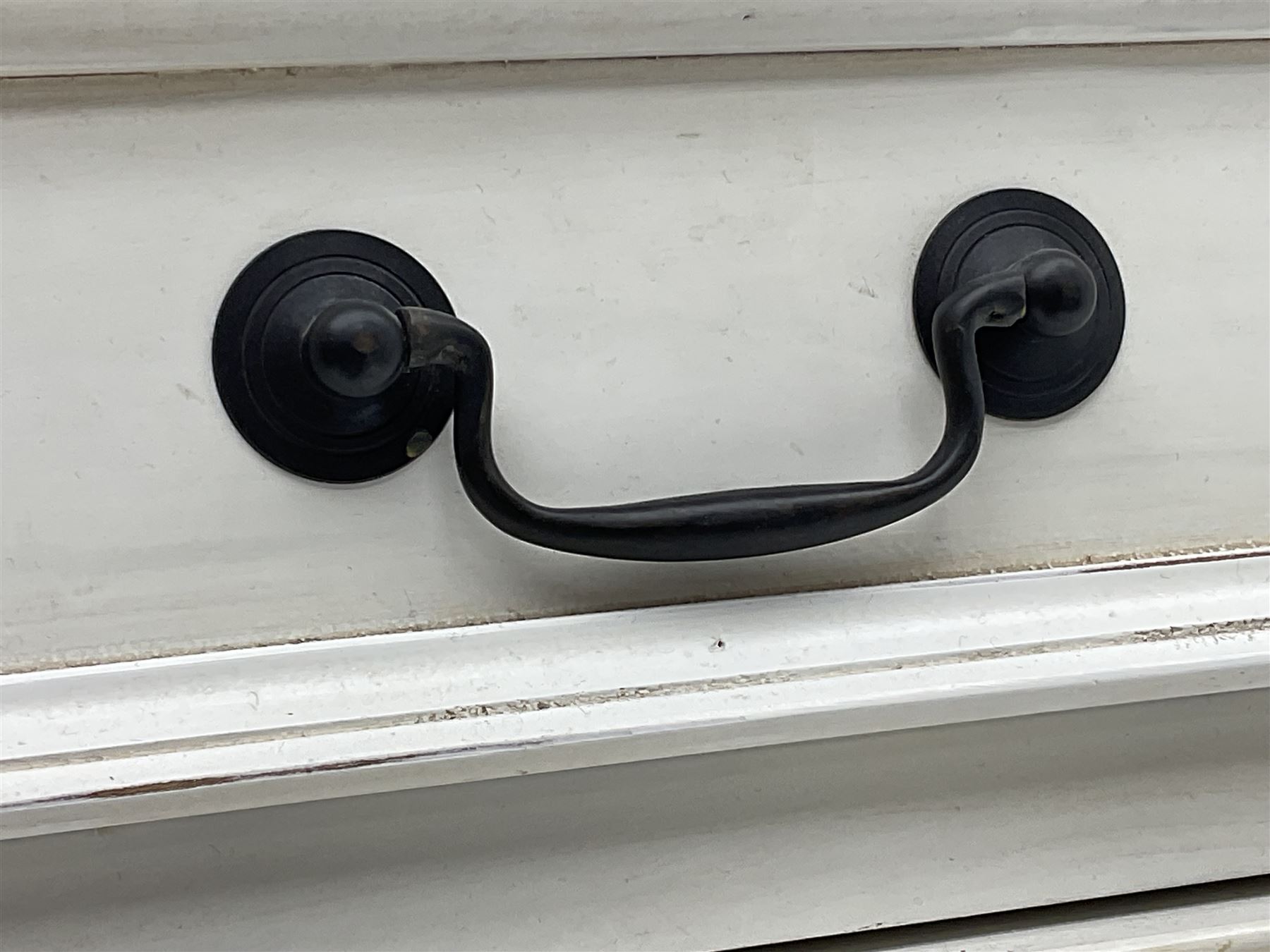 French design bombe shaped chest, moulded rectangular top over two short and three long drawers, on scrolled feet, in cream paint finish 