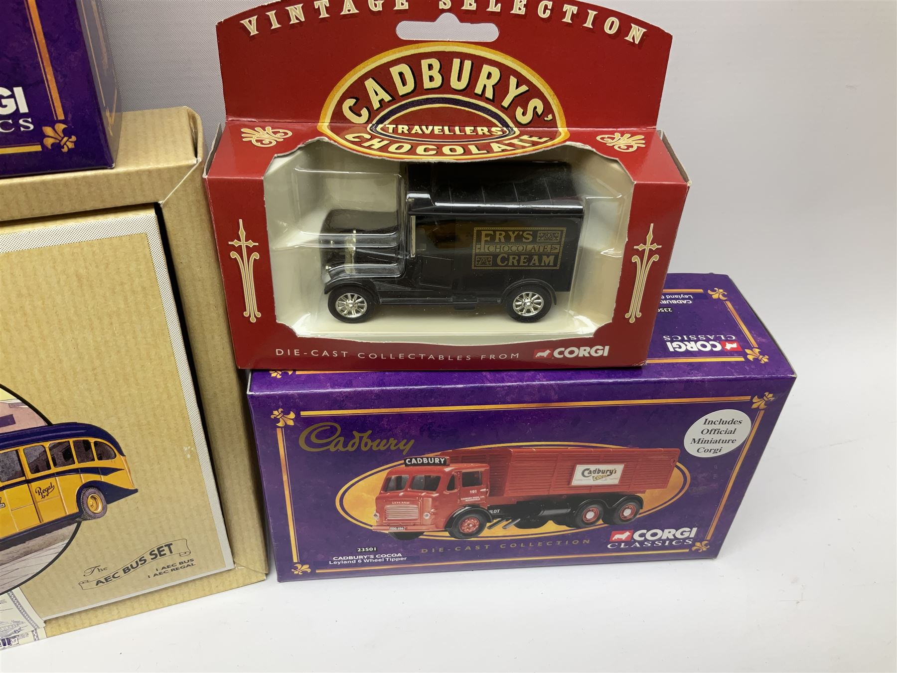 Corgi - four Weetabix promotional models; three Cadburys promotional models; United Dairies limited edition two-vehicle set; AEC limited edition two-vehicle bus set; and five other Corgi die-cast models/figures; all boxed (14)