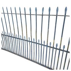 Two sections of painted iron garden or estate boundary railing, comprising a 19th century wrought iron section with graduated spearhead uprights, together with a later hoop-top section with ball-finial end posts, both in blue painted finish