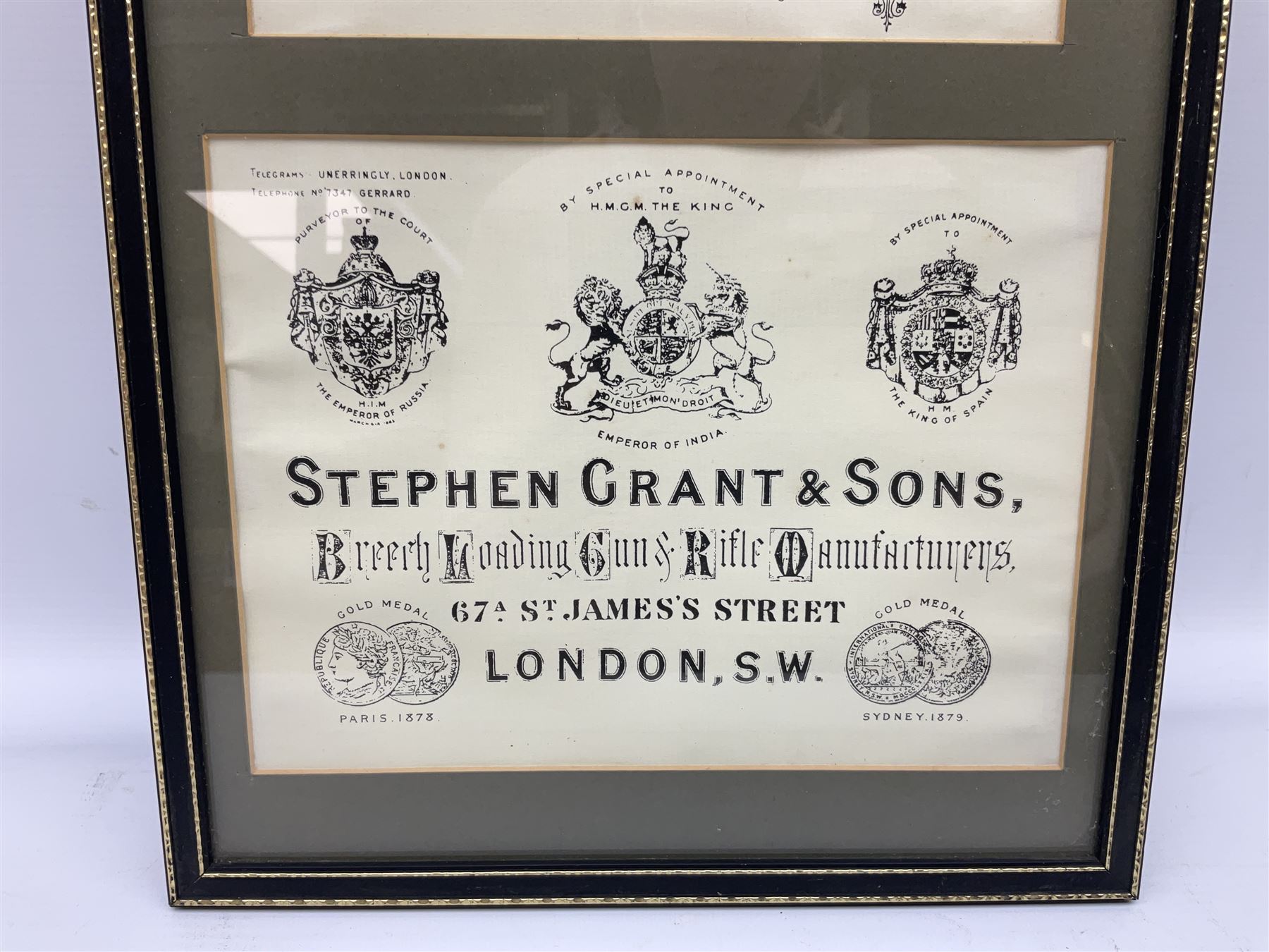 Framed display of three trade gun case labels for Joseph Lang & Son, Henry Atkin and Stephen Grant & Sons, mounted in Hogarth style frame 56 x 25cm