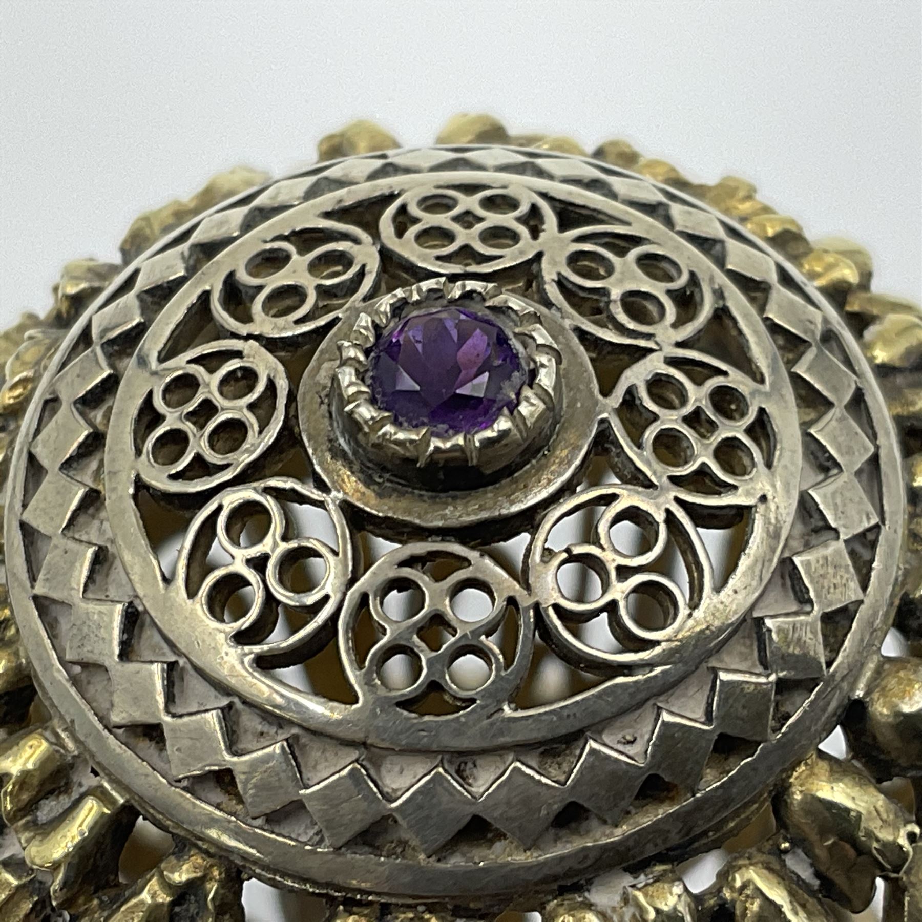 Modern silver limited edition Easter egg, no. 70/500, the gilt openwork body decorated with cascading bluebells and hinged cover with pierced circular panel set with a single faceted purple stone, opening to reveal a gilt interior, upon silver stand with three scrolling pad feet, each hallmarked St James House Company, London 1981, height including stand 8cm