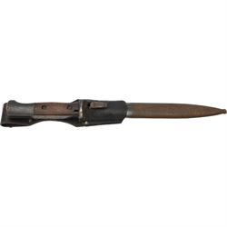 WWII German bayonet marked S/174, in scabbard, with leather frog, the frog marked H. Glemen Elberfeld 1938, together with another German bayonet and frog  